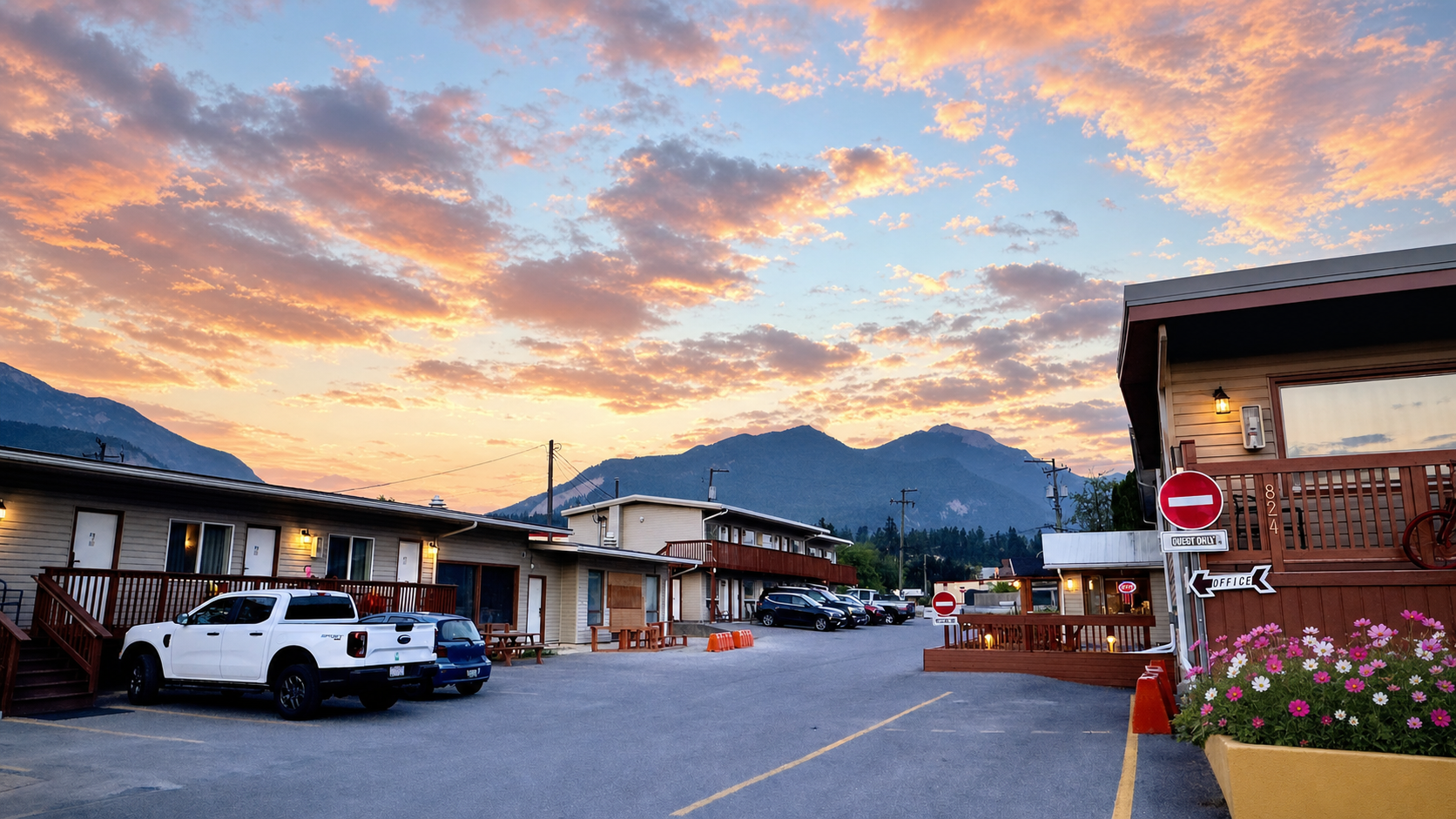 Rondo Motel sign with the Rocky Mountains in the background